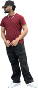 Side-profile portrait of Harmanpreet wearing a casual outfit on a white background